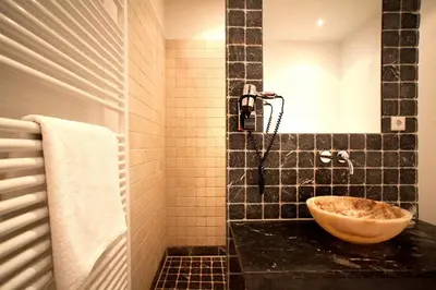 Ein Badezimmer in der Unterkunft Hotel Aleksandra