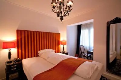 Ein Bett oder Betten in einem Zimmer der Unterkunft Hotel Aleksandra