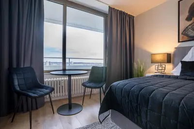 Ein Bett oder Betten in einem Zimmer der Unterkunft RüSuite - Gemütliches Apartment in Rüttenscheid