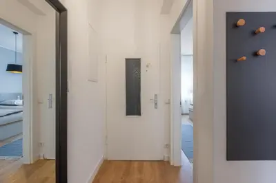 Ein Bett oder Betten in einem Zimmer der Unterkunft Glück Auf Appartements Hufelandstraße Essen