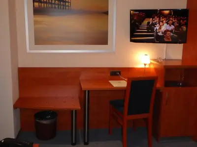 Ein Sitzbereich in der Unterkunft Astoria Hotel
