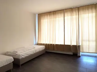 Ein Bett oder Betten in einem Zimmer der Unterkunft Gerresheimer Republic