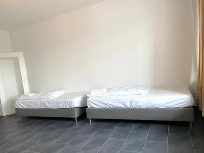 Ein Bett oder Betten in einem Zimmer der Unterkunft Gerresheimer Republic