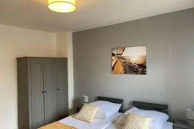 Ein Bett oder Betten in einem Zimmer der Unterkunft Gemütliche Wohnung zwischen Grün und Duisburg Hbf