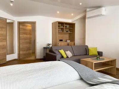 Ein Bett oder Betten in einem Zimmer der Unterkunft OlfenLodge