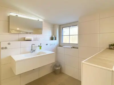 Ein Badezimmer in der Unterkunft OlfenLodge