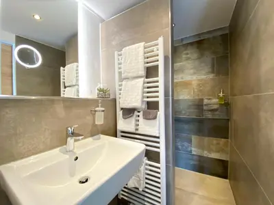 Ein Badezimmer in der Unterkunft OlfenLodge