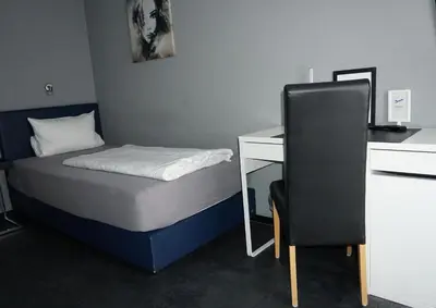 Ein Bett oder Betten in einem Zimmer der Unterkunft Hotel Come In