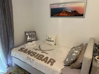 Ein Bett oder Betten in einem Zimmer der Unterkunft Appartement House Dortmund 