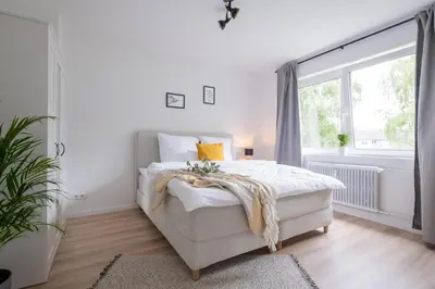 Ein Bett oder Betten in einem Zimmer der Unterkunft cruwzo I Apartment Rüttenscheid- Grün & Zentral