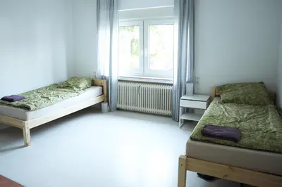 Ein Bett oder Betten in einem Zimmer der Unterkunft Work & Travel