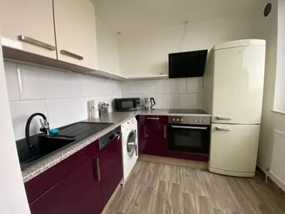Küche/Küchenzeile in der Unterkunft Modernes Apartment Duisburg Homberg