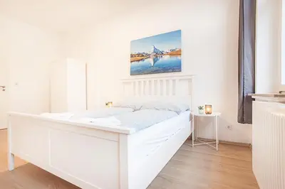 Ein Bett oder Betten in einem Zimmer der Unterkunft TM Studio