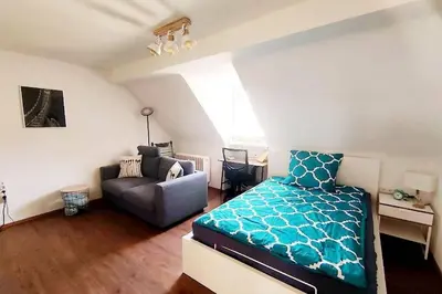 Ein Bett oder Betten in einem Zimmer der Unterkunft Gemütliches Apartment Nähe DU Zentrum/Uni/Hbf/A40