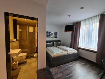Ein Badezimmer in der Unterkunft Hotel Aleo