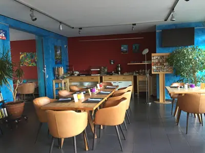 Ein Restaurant oder anderes Speiselokal in der Unterkunft Hotel Aleo