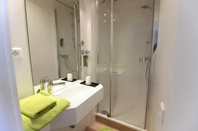 Ein Badezimmer in der Unterkunft An der Persiluhr Stadt-gut-Hotel