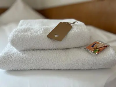 Ein Bett oder Betten in einem Zimmer der Unterkunft Aal-Kate