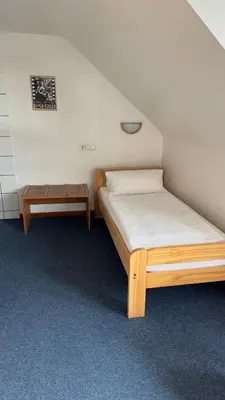 Ein Bett oder Betten in einem Zimmer der Unterkunft Aal-Kate