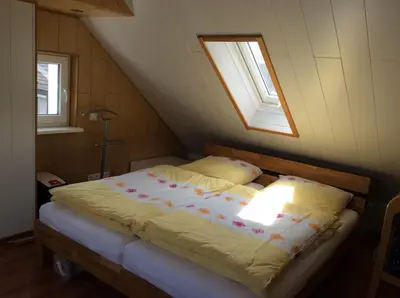 Ein Bett oder Betten in einem Zimmer der Unterkunft Ferienwohnung A&K