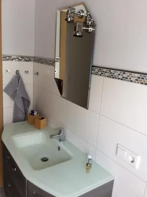 Ein Badezimmer in der Unterkunft Ferienwohnung A&K