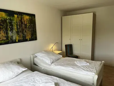 Ein Bett oder Betten in einem Zimmer der Unterkunft Am Nordglacis