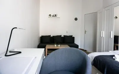 Ein Bett oder Betten in einem Zimmer der Unterkunft Vorhalle Apartment