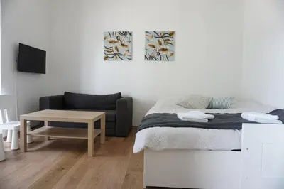 Ein Bett oder Betten in einem Zimmer der Unterkunft Vorhalle Apartment
