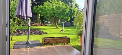 Ein Garten an der Unterkunft All-in-One Apartment mit eigener Sonnenterrasse im Garten