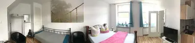 Ein Bett oder Betten in einem Zimmer der Unterkunft Gästewohnung in Schwelm