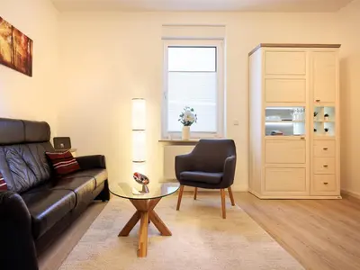 Ein Sitzbereich in der Unterkunft Modern Home Check-in & chill down auf 65 qm²