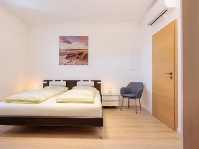 Ein Bett oder Betten in einem Zimmer der Unterkunft Modern Home Check-in & chill down auf 65 qm²