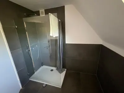 Ein Badezimmer in der Unterkunft Warzalas Apartement