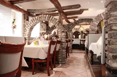 Ein Restaurant oder anderes Speiselokal in der Unterkunft Langerfelder Hof