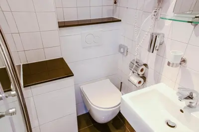 Ein Badezimmer in der Unterkunft Langerfelder Hof
