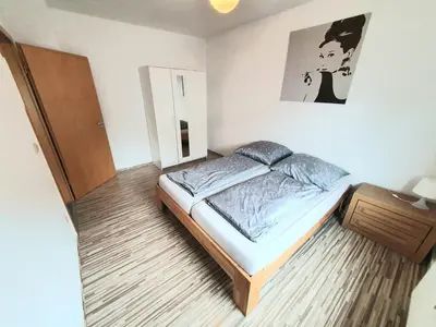 Ein Bett oder Betten in einem Zimmer der Unterkunft Lieblingsmensch Oberhausen