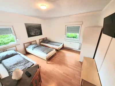 Ein Bett oder Betten in einem Zimmer der Unterkunft Lieblingsmensch Oberhausen