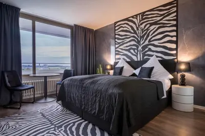 Ein Bett oder Betten in einem Zimmer der Unterkunft RüSuite II - Gemütliches Apartment in Rüttenscheid