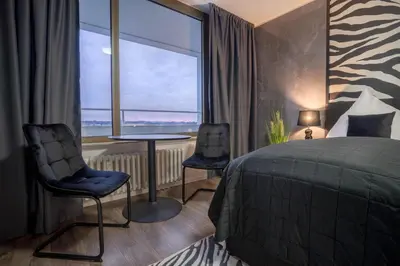 Ein Bett oder Betten in einem Zimmer der Unterkunft RüSuite II - Gemütliches Apartment in Rüttenscheid