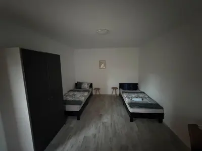 Ein Bett oder Betten in einem Zimmer der Unterkunft Boarding House Hagen