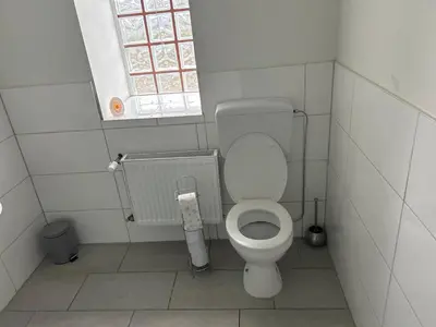 Ein Badezimmer in der Unterkunft Boarding House Hagen