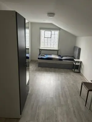 Ein Bett oder Betten in einem Zimmer der Unterkunft Boarding House Hagen