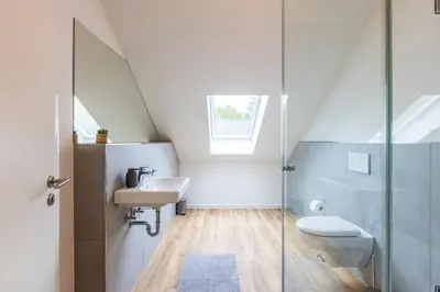 Ein Badezimmer in der Unterkunft Glück Auf Appartements Kaiserstraße Mülheim