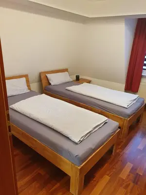 Ein Bett oder Betten in einem Zimmer der Unterkunft Ferienwohnung Calabria Nr 3