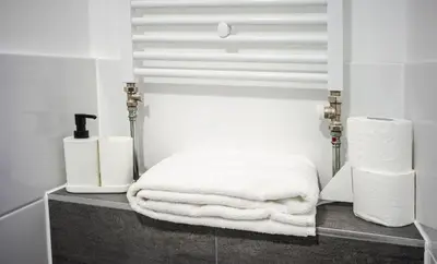 Ein Bett oder Betten in einem Zimmer der Unterkunft M&M Löwen Hotel