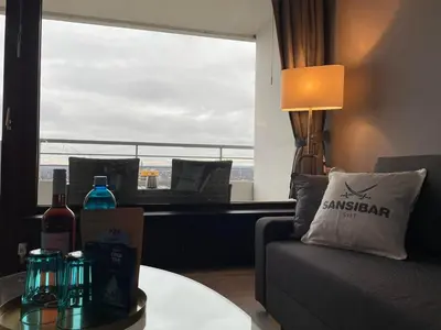 Ein Sitzbereich in der Unterkunft Themenpartment Himmel und Mehr Penthouse