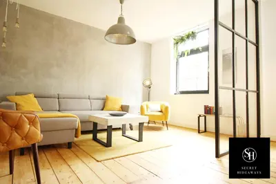 Ein Sitzbereich in der Unterkunft zentrales NewYork-Designapartment mit 2 Betten nahe Messe l Flughafen