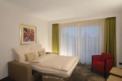 Ein Bett oder Betten in einem Zimmer der Unterkunft Naundrups Hof