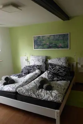 Ein Bett oder Betten in einem Zimmer der Unterkunft Ferienwohnungen Federleicht