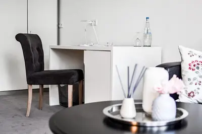 Ein Sitzbereich in der Unterkunft Parkhotel FRITZ am Brunnen